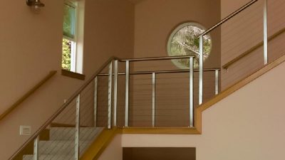 This Camas staircase remodel makes a huge difference to the property. The WA cable railing manufacturer, AGS, prefabricates and ships the stainless railing systems ready to install. 