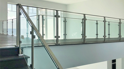 This Florida glass rail remodel was perfect for homeowners who wanted a modern staircase railing design. They also chose the Glacier glass handrail for the upstairs balcony railing design.