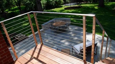 This Leawood deck railing is an example of a prefabricated railing system by AGS, who shipped the Kansas stainless railing to the job site, ready to install.
