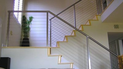 This Orange County stair cable railing remodel idea is an excellent addition to a modern California home. If you want to remodel railing in Orange County, AGS prefabricates the railing systems and ships them all over the state. A California cable railing should be manufactured from 316 because it is corrosion-resistant.