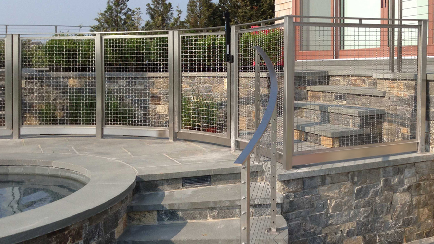 There's no such thing as pet proof railing, but mesh panels help keep your furry friends safe.