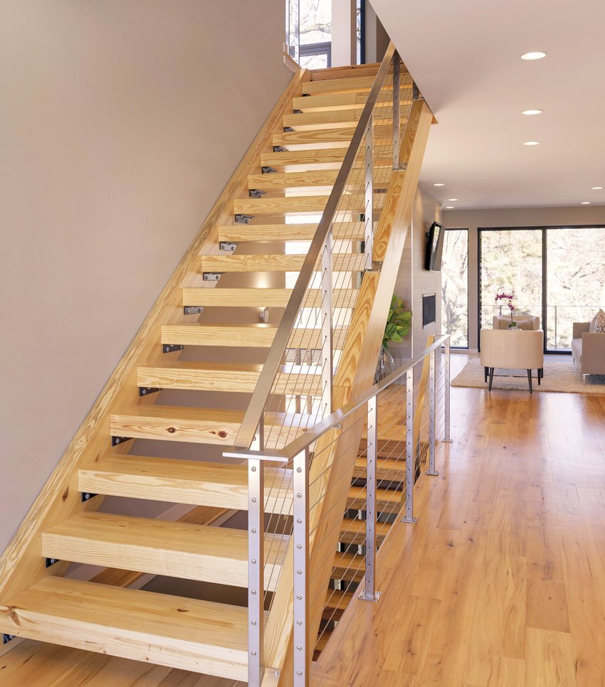 Image of a stair with metal railings.