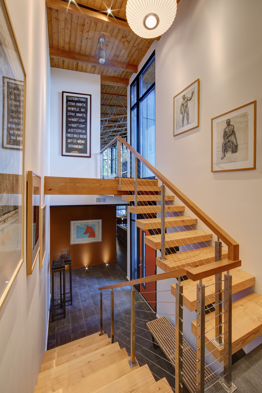 Photo of a staircase with railing.