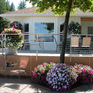 Hanging Garden on Stone Patio with Rail