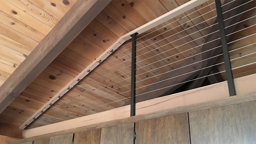 Rustic Interior with a Rainier Cable Railing by AGS Stainless