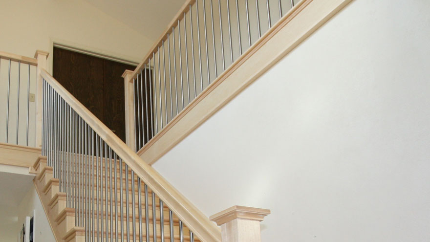 Traditional Interior with an Olympus Bar Railing by AGS Stainless