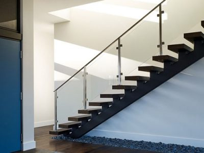 Glacier glass railing on straight stairs.