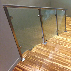 Round Handrail on Glass Rail by AGS Stainless