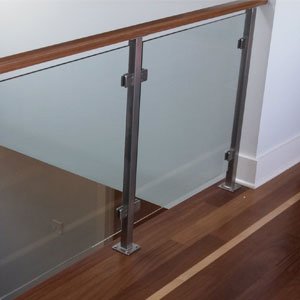 Wood Handrail on Glass Rail by AGS Stainless