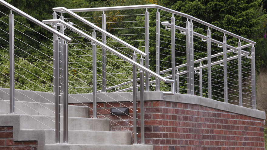 Cable railing on steps. Cable railing system on ramp.