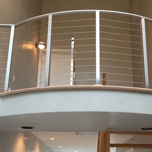 Curved Cable Balcony Rail by AGS Stainless