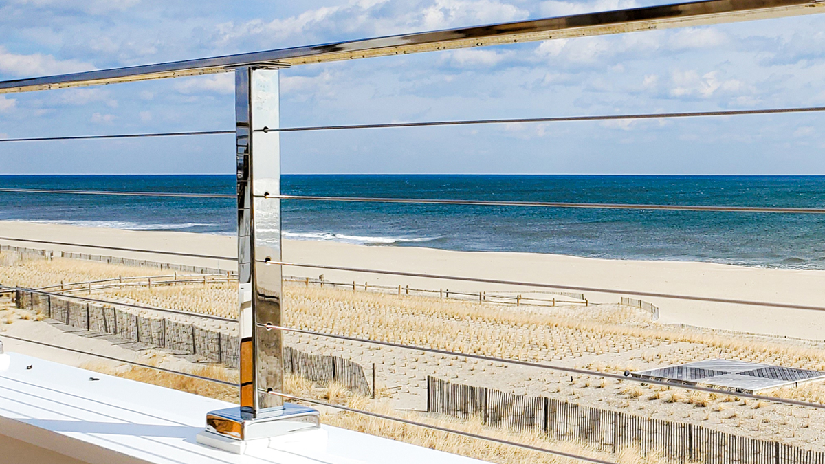 Custom stainless steel cable railing with mirror finish.