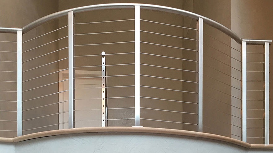 Contemporary Interior with a Rainier Cable Railing by AGS Stainless