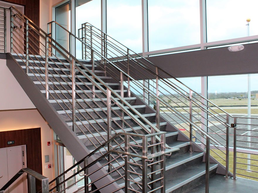 Tube railing used for a commercial stair railing installation.