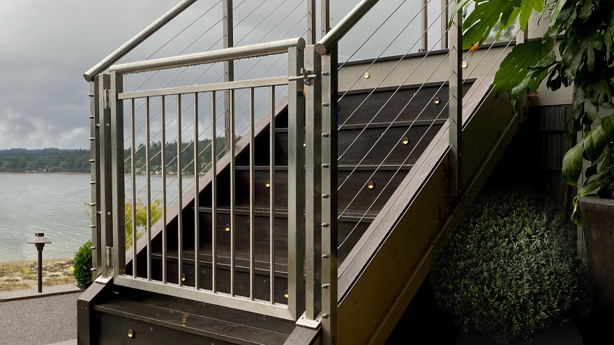 cable railing vs. rod railing. Railing system with cable and rod infill.