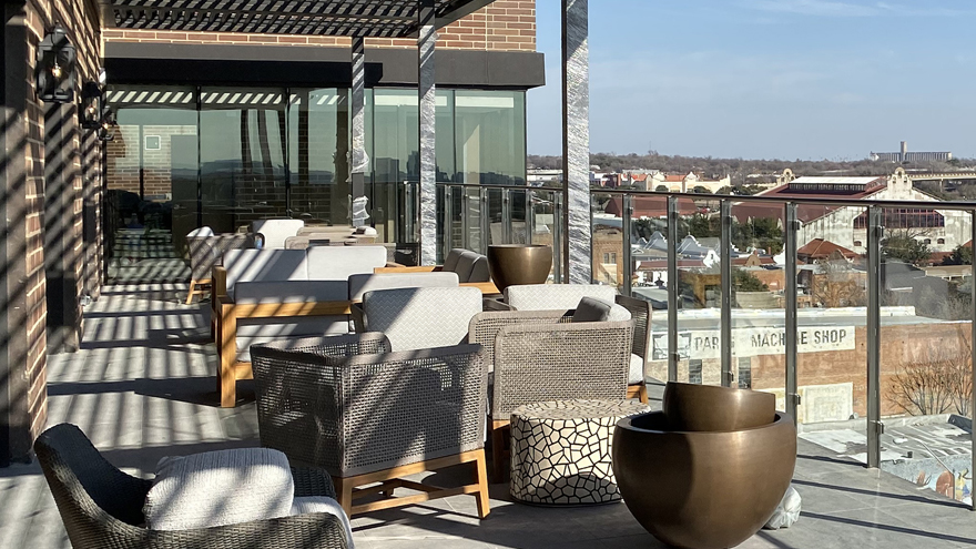 Rooftop railing system, tempered glass with stainless steel posts.