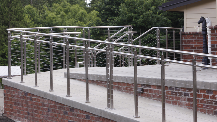Ramp railing system, custom railing posts with angled base plates for ramps.