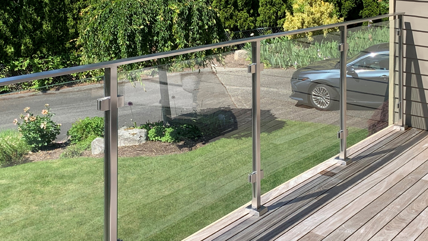 Glass panel railing systems provide shelter from the wind and look stunning.