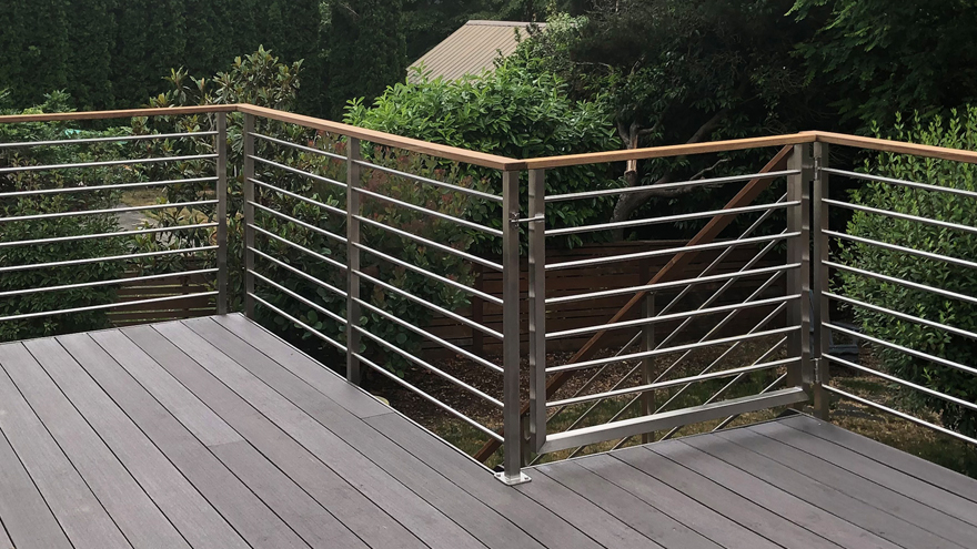 Horizontal bar railing system with a gate.