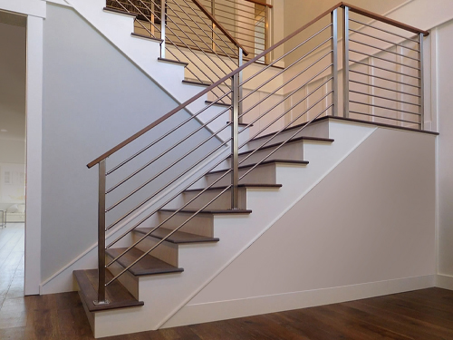 Horizontal bar railing on stairs, featured cable railing stair photo gallery.