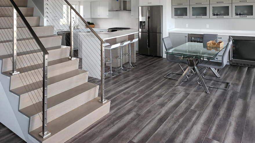 Kitchen railing design. Stainless steel railings for kitchens are ideal because they match the appliances and are a modern railing system.