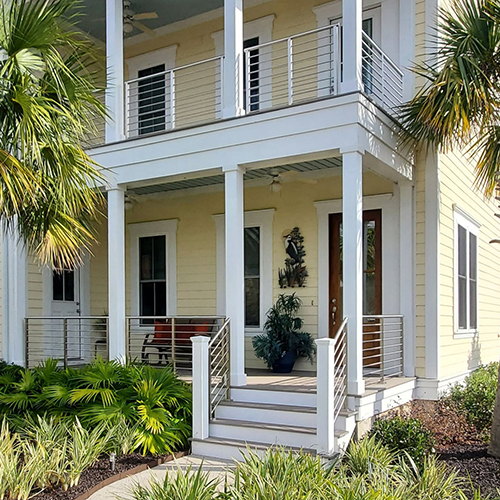 Metal horizontal rod railing for porch pairs with modern balcony handrail. Stainless rod railing in South Carolina 