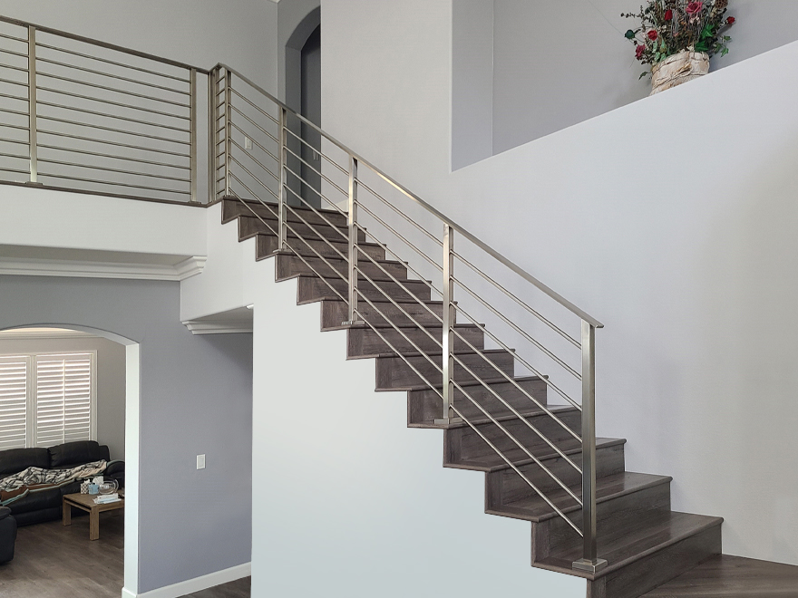 Step and stair handrails with horizontal rod infill creates the look of luxury.