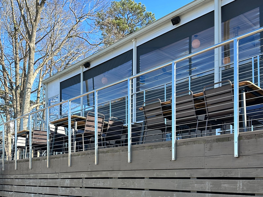 Deck cable rail allows guests at the restaurant to enjoy the view. The cable deck railing is corrosion-resistant.