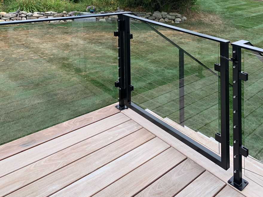 Black glass railing with gate. See through deck railing does not obsure the view.