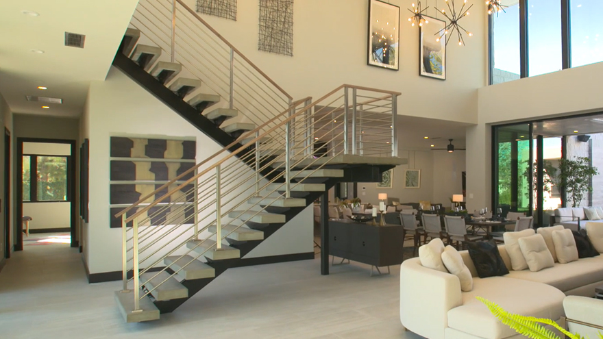 A stainless staircase railing with floating stairs is one of many excellent staircase railing ideas.