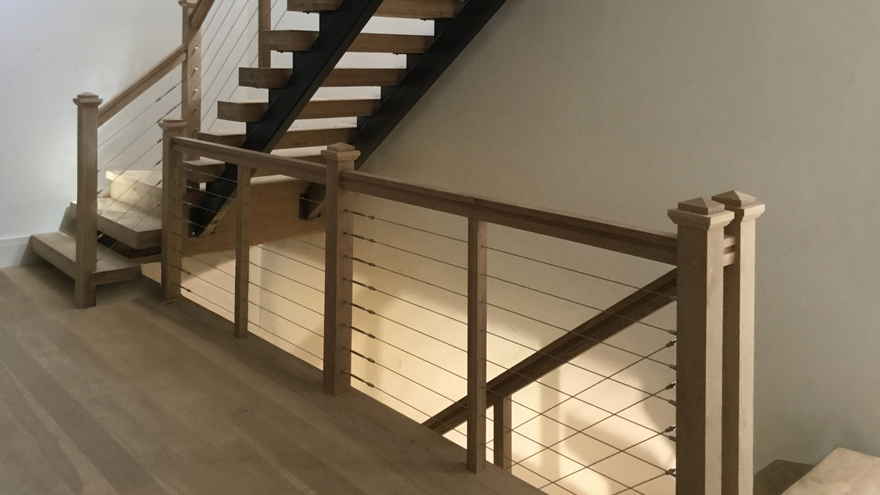 For a stair remodel, cable stair railing is a good option paired with open staircases if you want a modern stairs look.