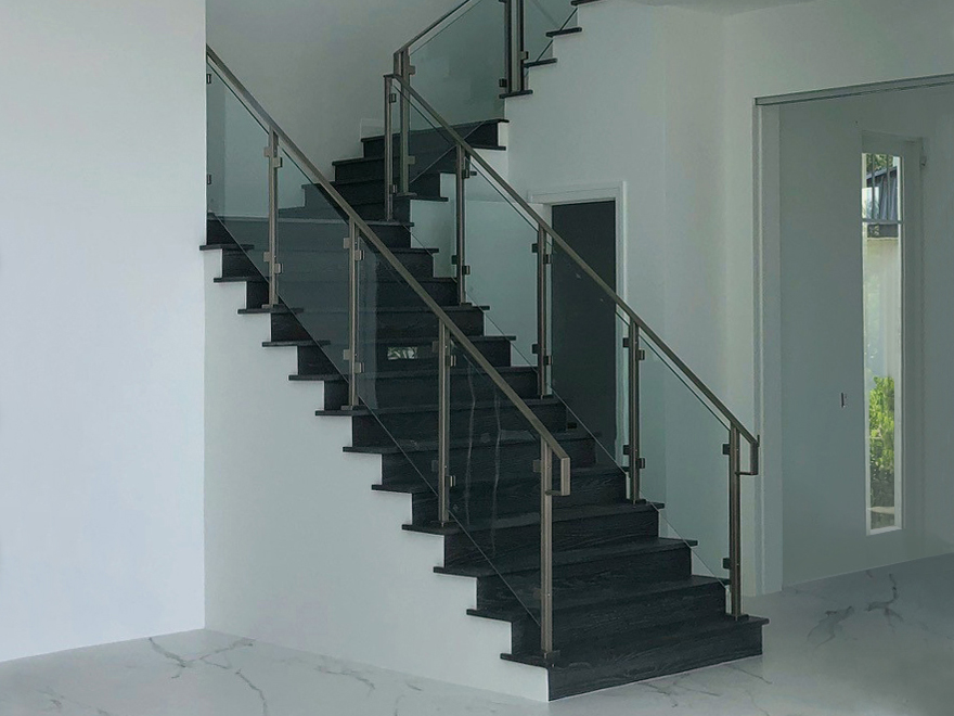 Interior glass railing systems provide an upscale, luxurious look. Glass stairs railing systems are custom-designed to your specifications.