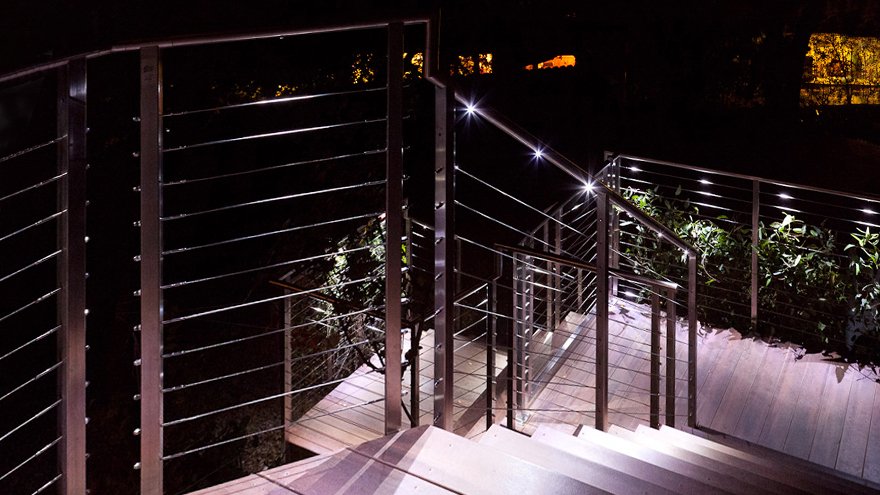 Outdoor deck lights are added to the handrail.