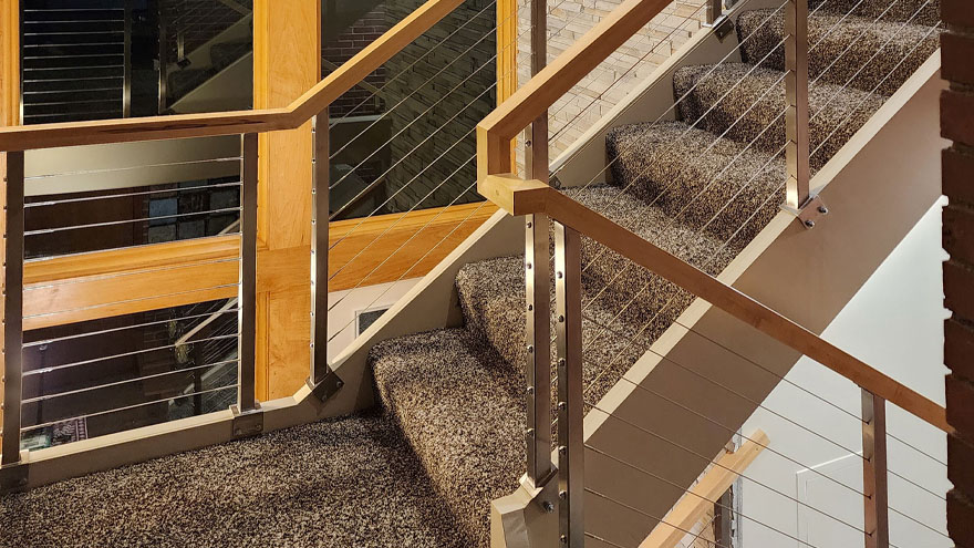 This metal railing for stairs modernizes the property's looks.