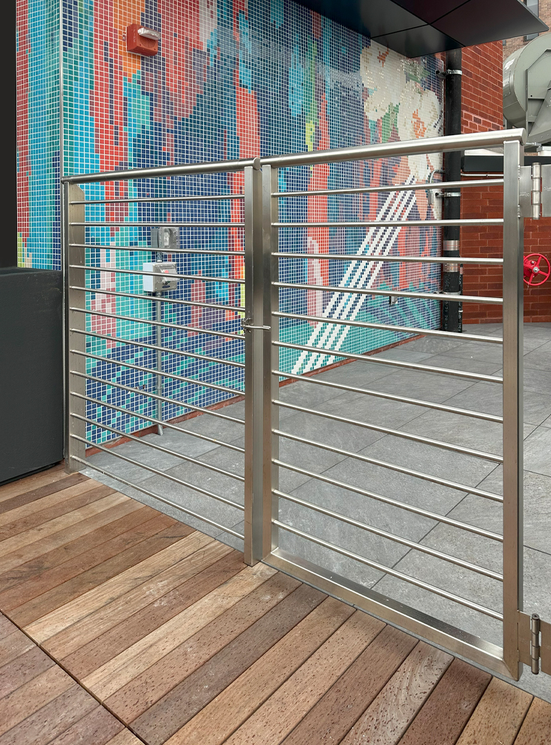 Gate for commercial roof railing system.